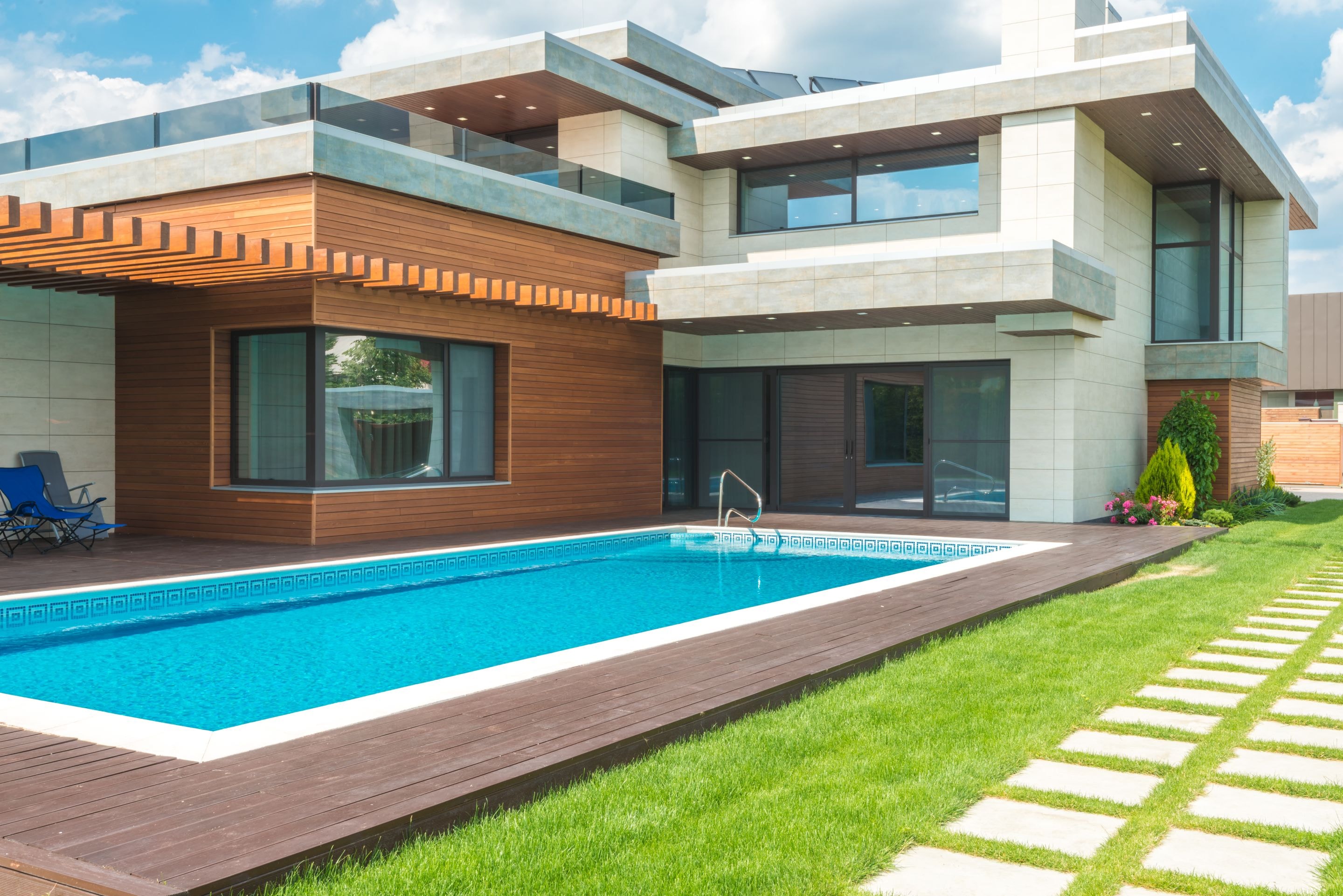 Modern villa with pool, deck and garden